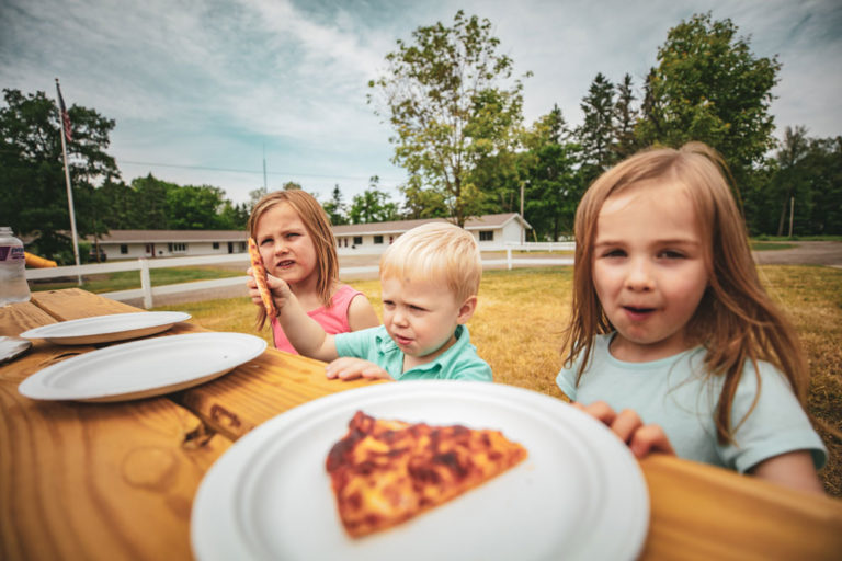 Children enjoying food at family resort in Minnesota