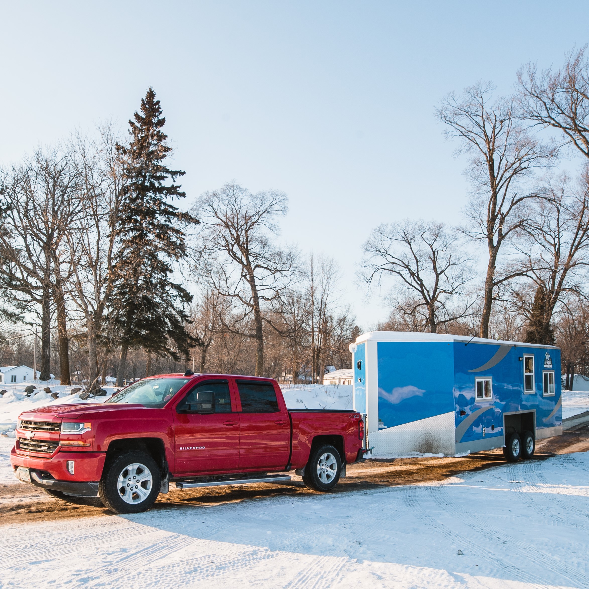 Truck and Wheelhouse travelling onto Mille Lacs Lake
