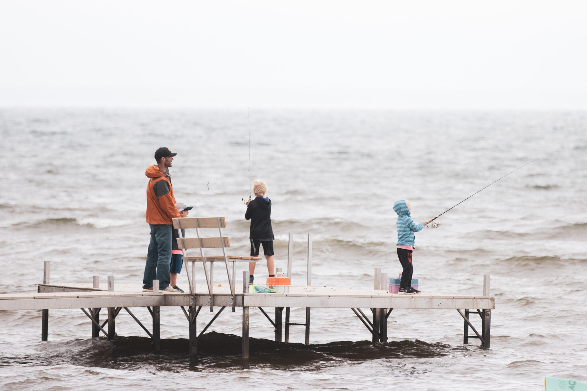 Fishing from the dock at The Red Door Resort on Lake Mille Lacs