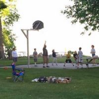 group of people playing basketball at summer family resort on Lake Mille Lacs